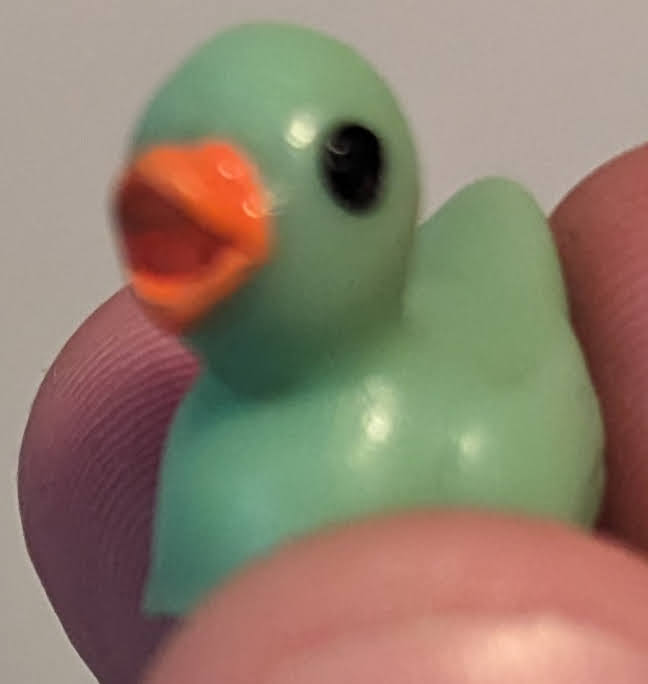 A silly green duck